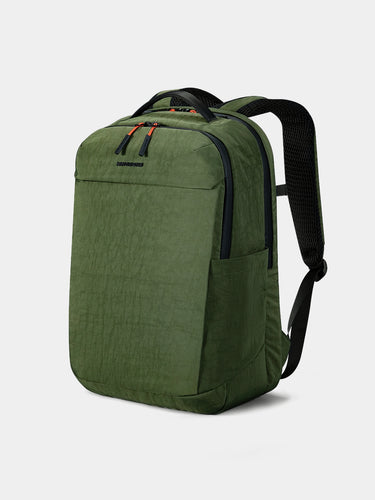 Green backpack on a light gray background