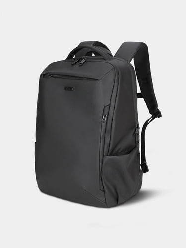 Black backpack on a light gray background