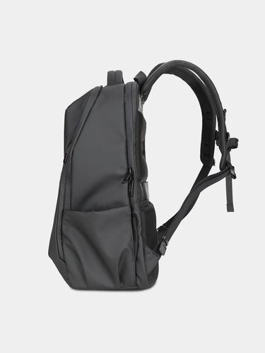 Black backpack on a light gray background