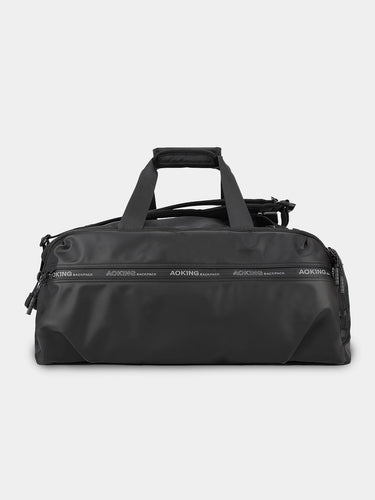 Black duffel bag with visible branding on a light gray background