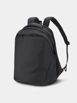 Black backpack on a light gray background