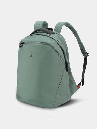 Green backpack on a light gray background