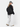 Woman wearing the Roam Anti-Theft Pack 23L in black