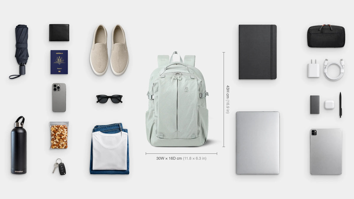 What fits inside the Metro Anti-Theft Pack 20L: Shown: 15.6" laptop, iPad, notebook, emmèton Flow Tech Pouch, charger and cable, power bank, earbuds, pen, emmèton Thermo Bottle 750ml, travel umbrella, snacks, slip-on shoes, jeans and t-shirt, sunglasses, wallet, passport, keys, phone.