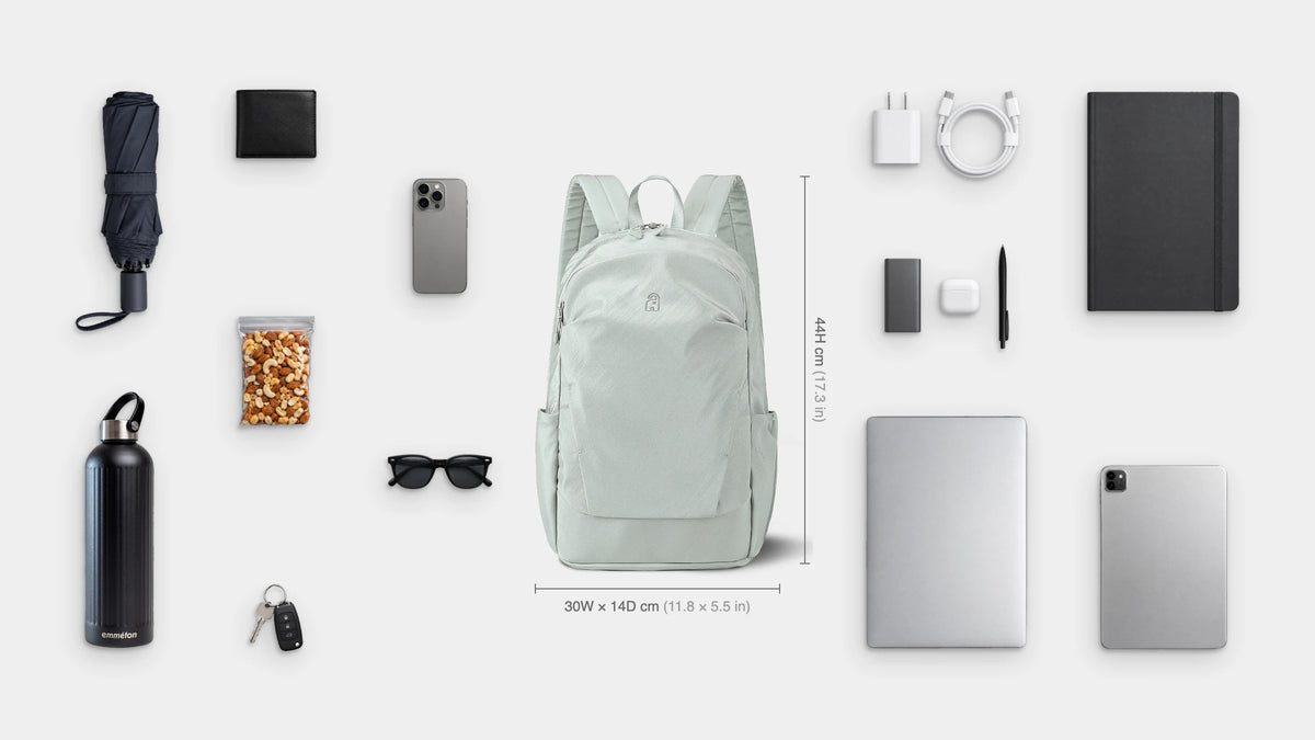 What fits inside the Tempo Anti-Theft Pack 18L: Shown: 14" laptop, iPad, notebook, charger and cable, power bank, earbuds, pen, emmèton Thermo Bottle 750ml, travel umbrella, snacks, sunglasses, wallet, keys, phone.
