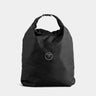 Travel laundry bag with a brand logo on a light gray background