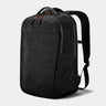 Black backpack on a light gray background
