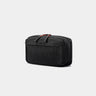 Black tech bag with red zipper on a light gray background