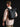 Man wearing the Venture Fold-Top Pack 18L in black