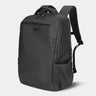 Black backpack on a light gray background