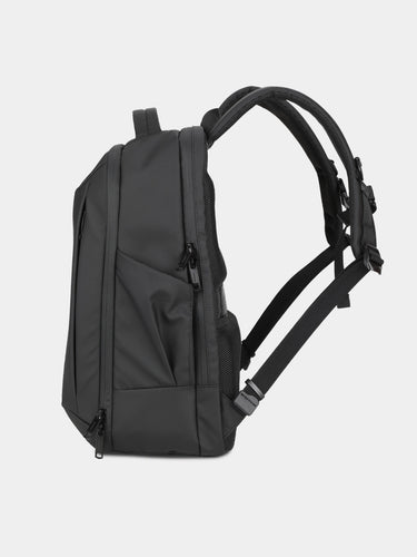 Black backpack on a light gray background