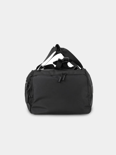 Black duffel bag on a light gray background