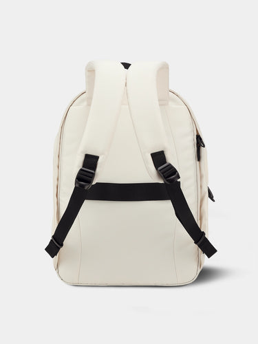 Beige backpack with black straps on a white background