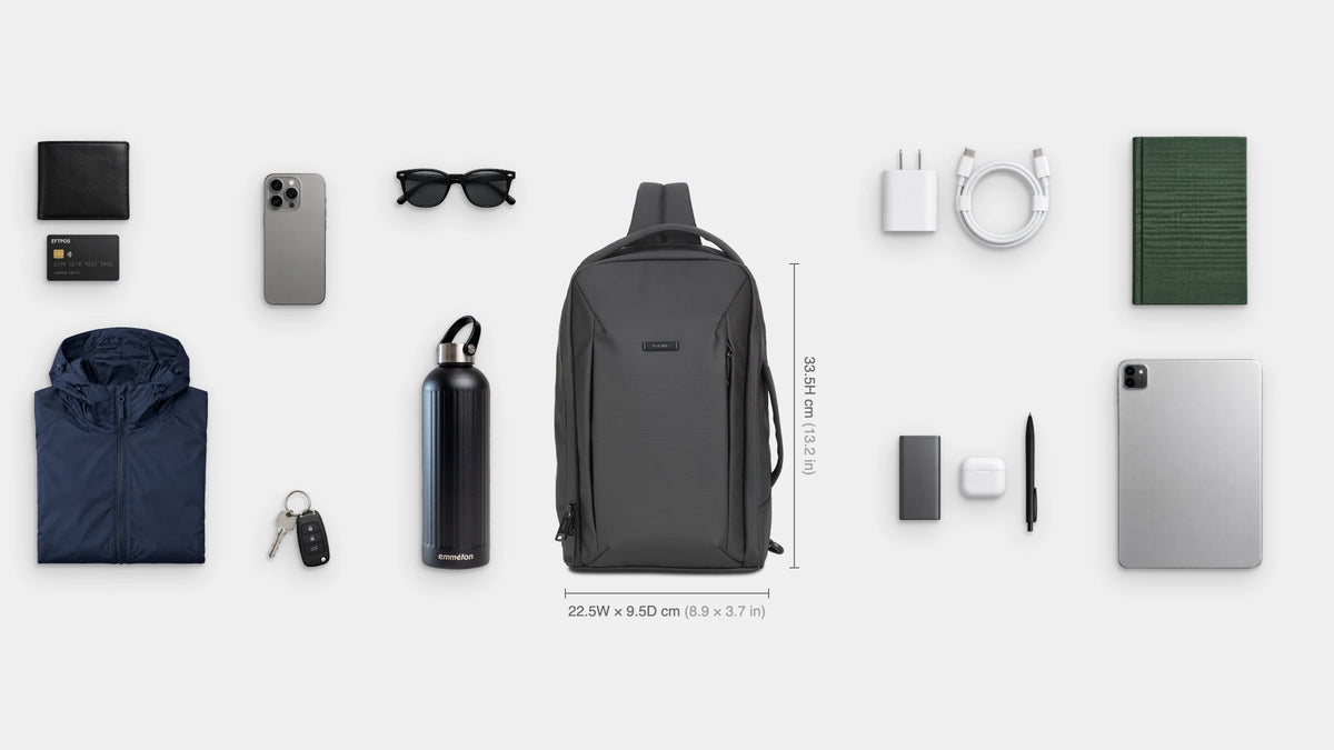 What fits inside the Everyday Anti-Theft Sling 7L: Shown: 11" iPad, pocket notebook, charger and cable, power bank, earbuds, pen, emmèton Thermo Bottle 750ml, light packable layer, sunglasses, wallet, EFTPOS card, keys, phone.