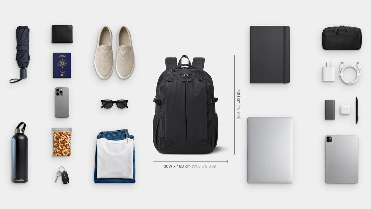 What fits inside the Metro Anti-Theft Pack 20L: Shown: 15.6" laptop, iPad, notebook, emmèton Flow Tech Pouch, charger and cable, power bank, earbuds, pen, emmèton Thermo Bottle 750ml, travel umbrella, snacks, slip-on shoes, jeans and t-shirt, sunglasses, wallet, passport, keys, phone.